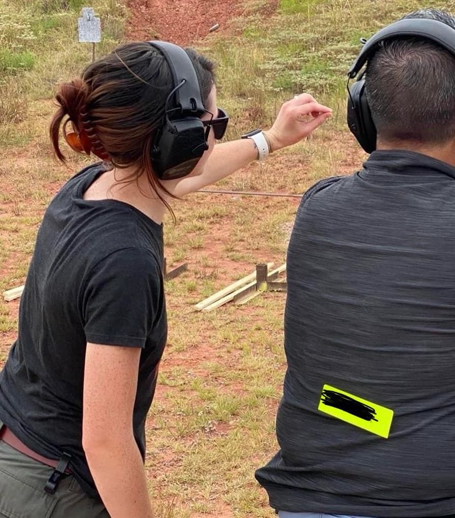 a picture of a woman coaching a student on how to properly accomplish their goals